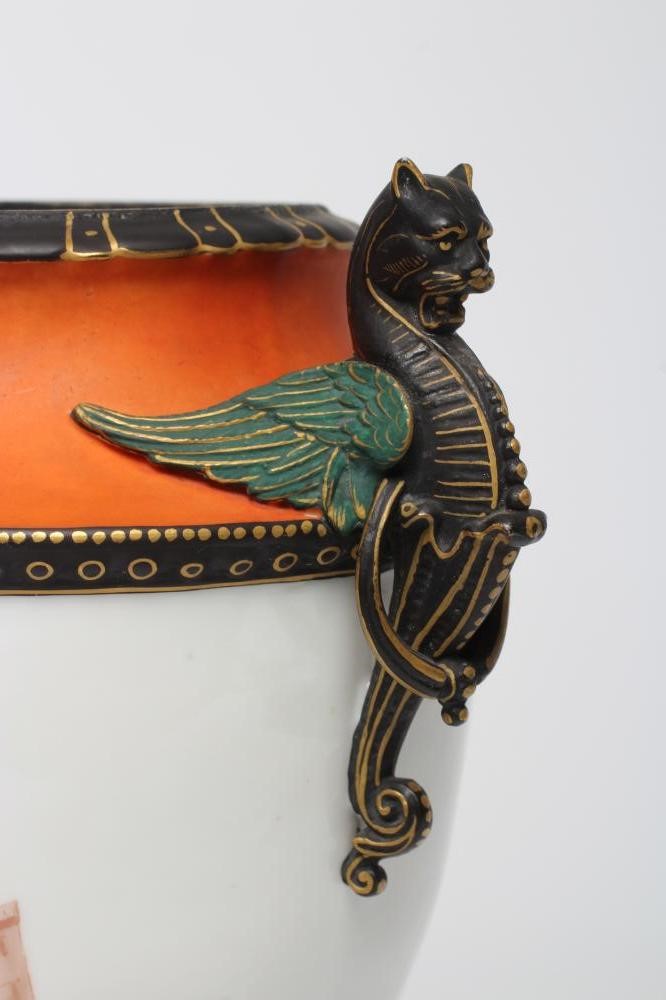 A PAIR OF FRENCH WHITE OPAQUE GLASS EMPIRE STYLE URNS Image