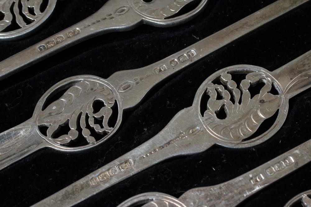 A SET OF SEVEN SILVER LOBSTER PICKS, by Frank Cobb, Sheffield 1928, of typical form centrally Image