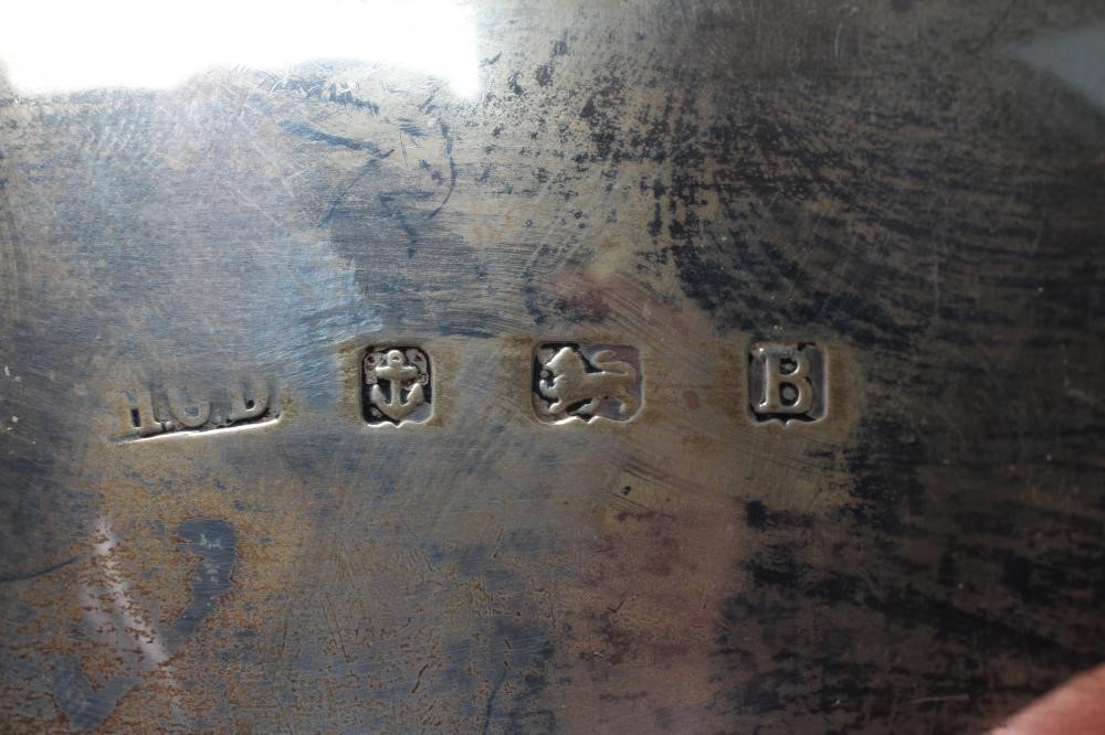 A SILVER THREE PIECE TEA SERVICE Image