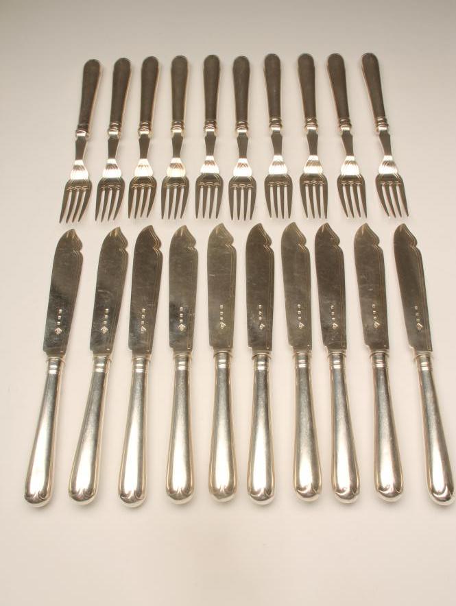 A SET OF TEN PAIRS OF SILVER HANDLED FISH KNIVES AND FORKS Image
