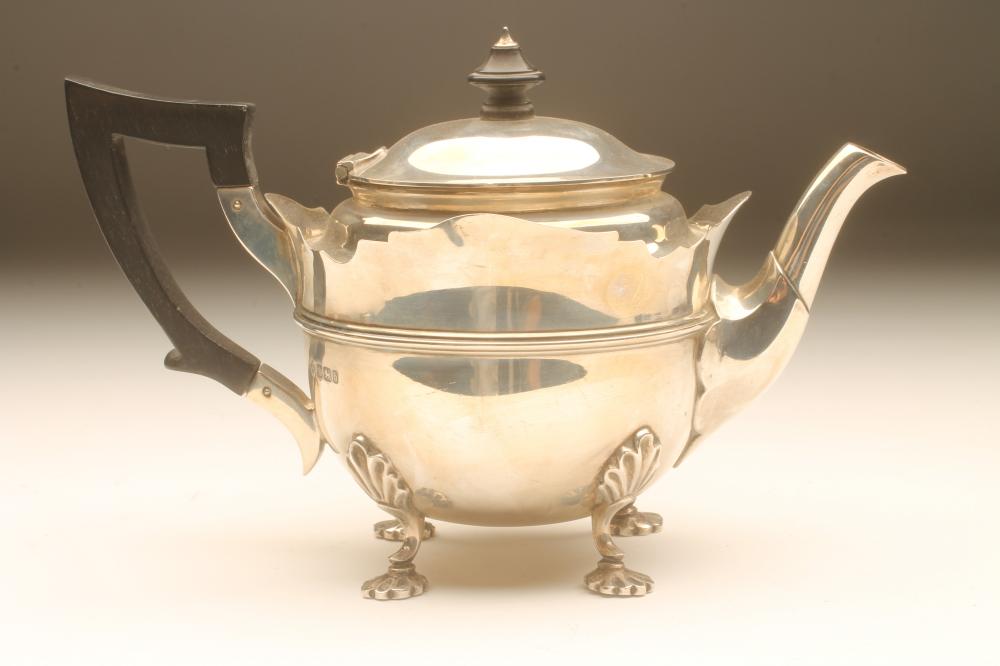 A BACHELOR'S LATE VICTORIAN SILVER TEAPOT Image