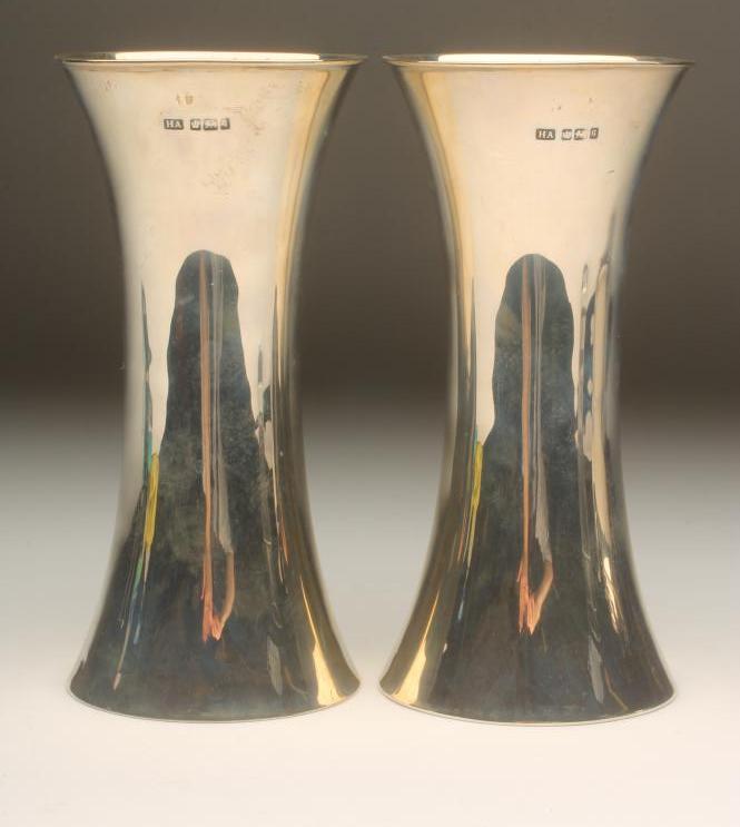 A PAIR OF EDWARDIAN SILVER VASES Image