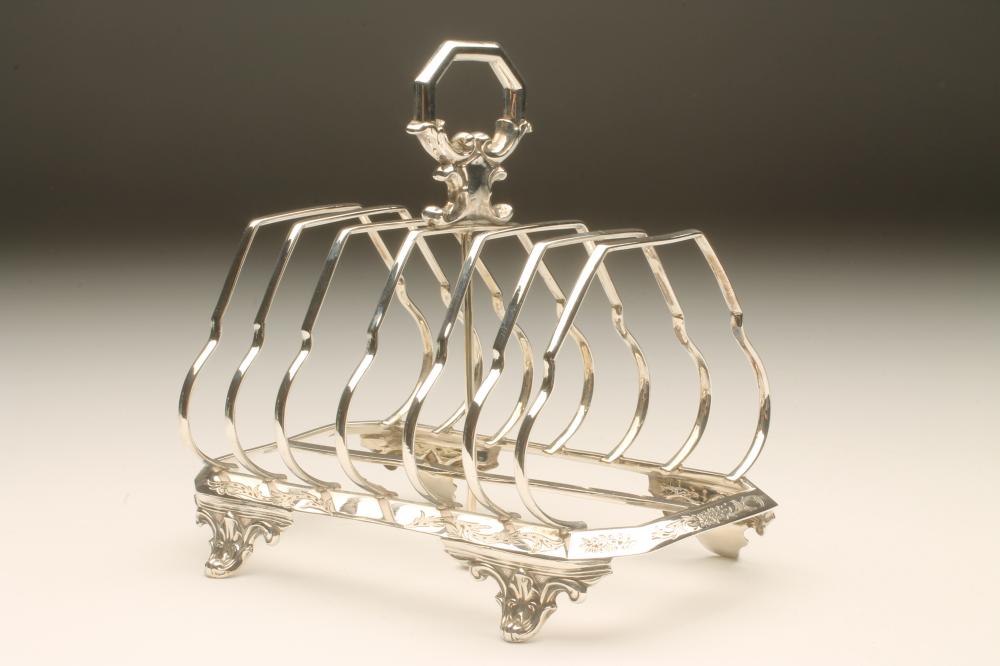 A VICTORIAN SILVER SEVEN BAR TOASTRACK Image