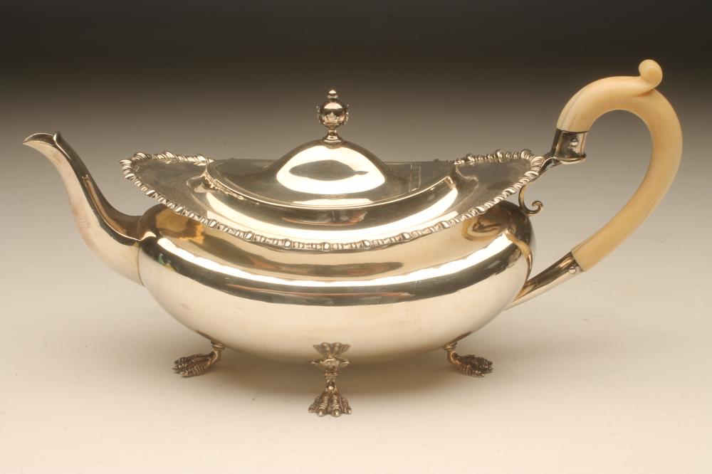 AN EDWARDIAN SILVER TEAPOT Image