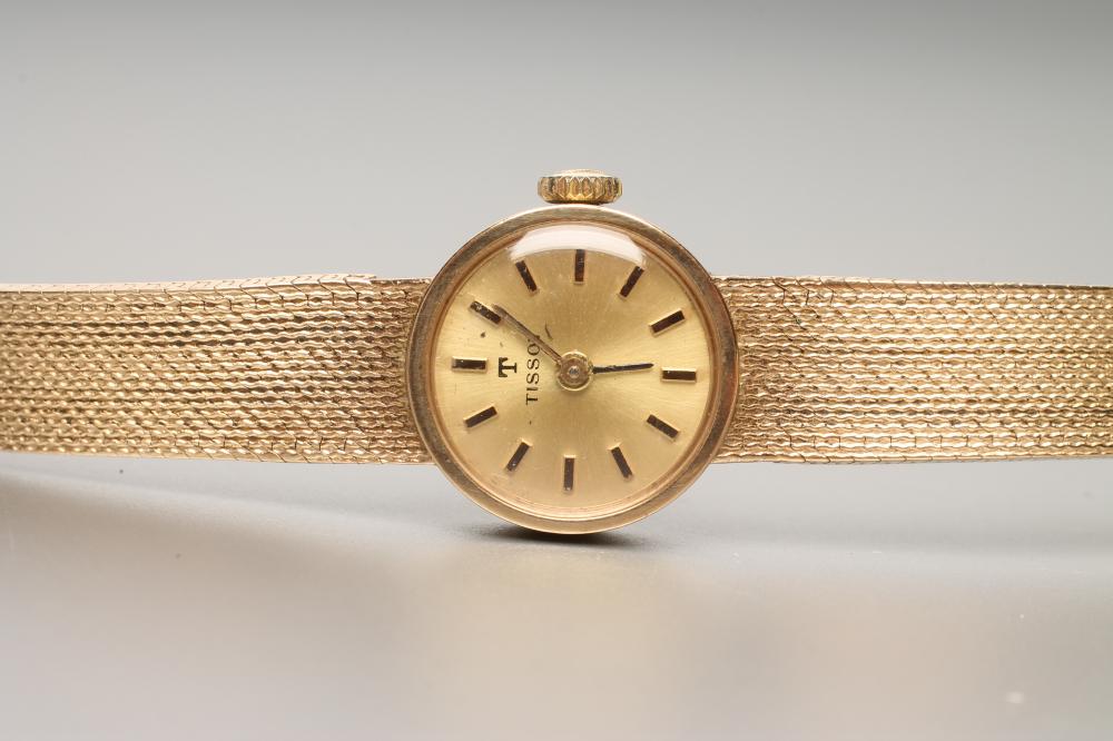 A LADY'S 9CT GOLD TISSOT WRISTWATCH Image