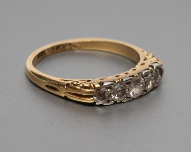 A FIVE STONE DIAMOND RING Image