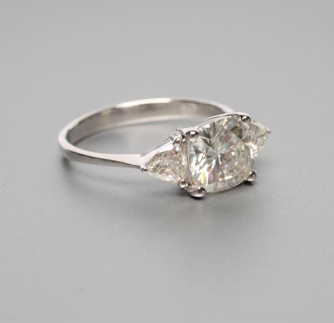 A THREE STONE MOISSANITE RING Image