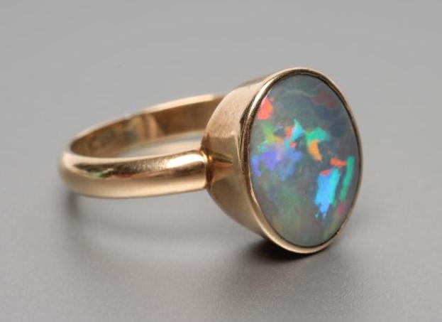 A VICTORIAN BLACK OPAL RING Image