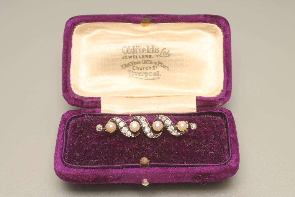 A VICTORIAN PEARL AND DIAMOND BROOCH Image
