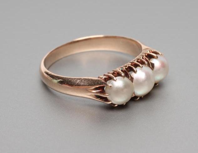 A VICTORIAN TRIPLE PEARL RING Image