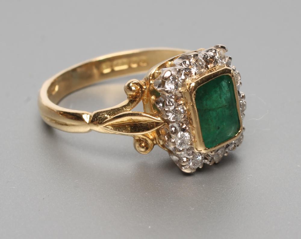 AN EMERALD AND DIAMOND RING Image