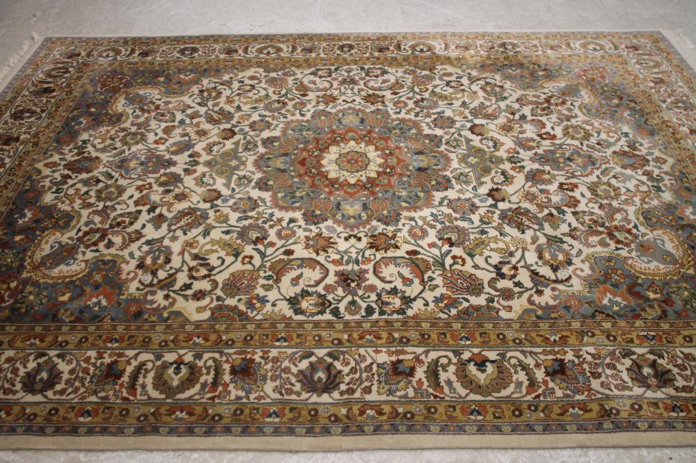 A PERSIAN STYLE WOOL CARPET Image
