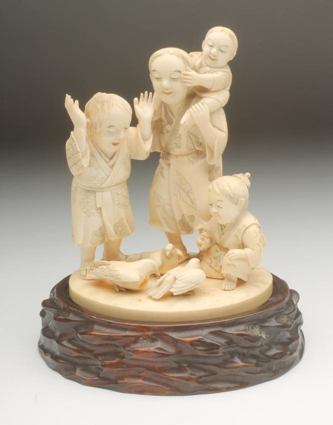 A JAPANESE SECTIONAL IVORY GROUP Image