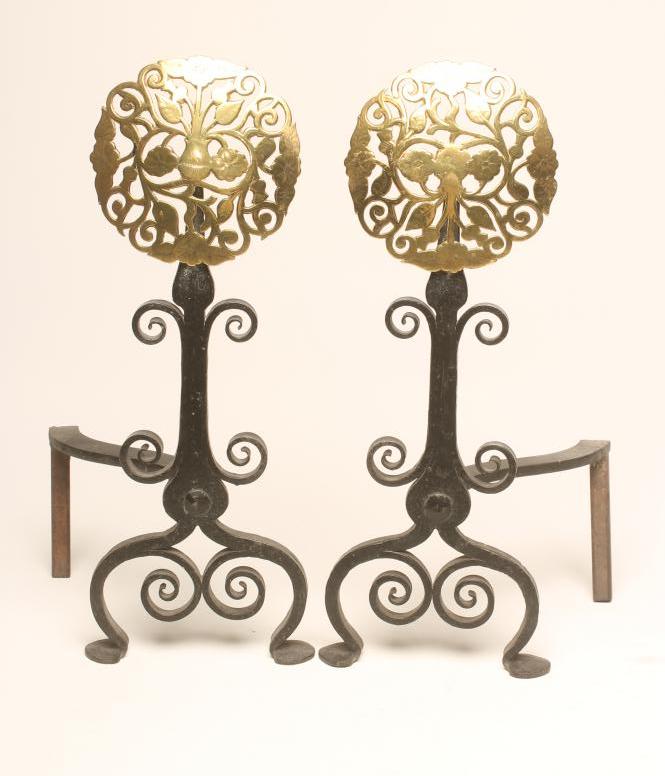 A PAIR OF ARTS AND CRAFTS WROUGHT IRON ANDIRONS Image