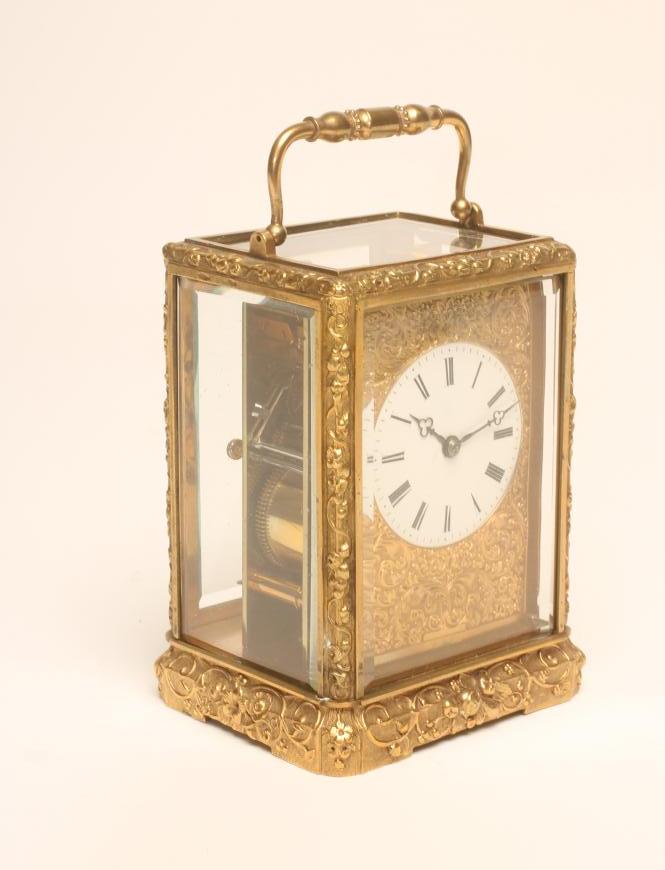 A BRASS CASED CARRIAGE CLOCK Image