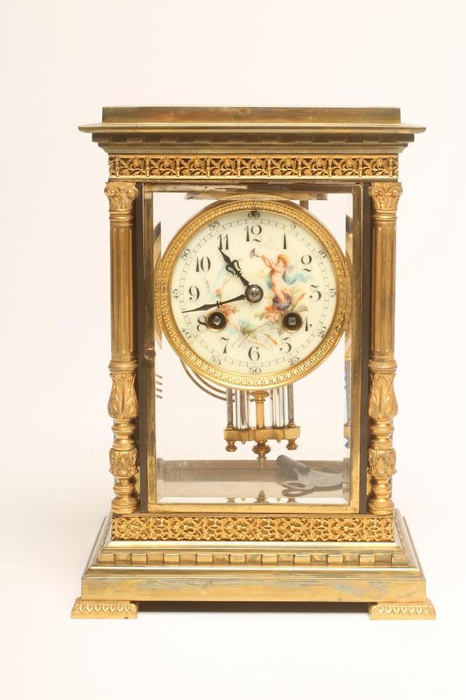 A FRENCH BRASS CASED FOUR GLASS MANTEL CLOCK Image