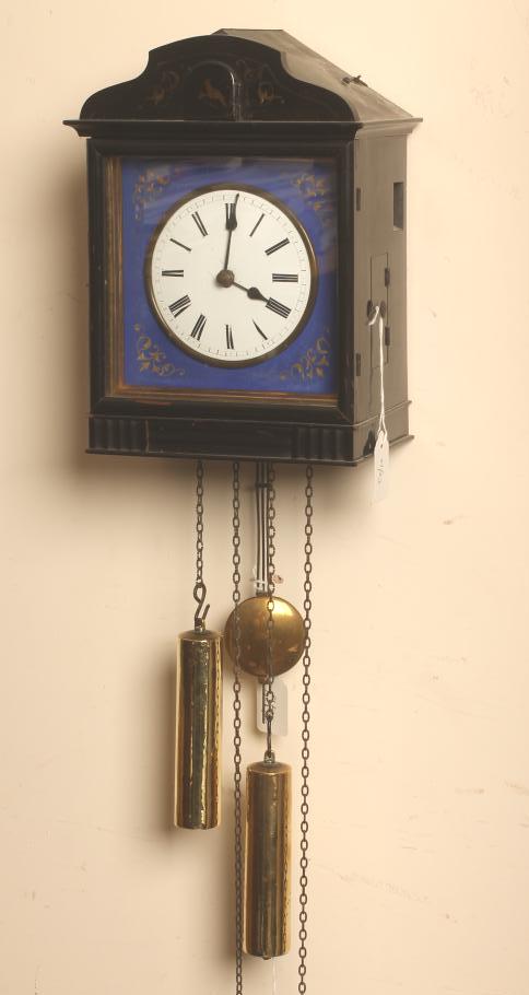 AN EBONISED CASED WALL HANGING CUCKOO CLOCK Image
