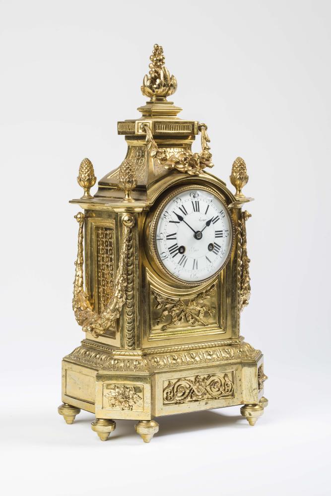 A GILDED BRASS CASED MANTEL CLOCK by Roger Paris Image