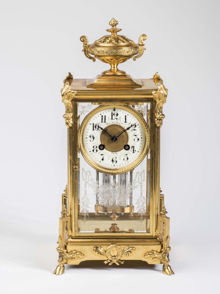 A FRENCH FOUR GLASS MANTEL CLOCK Image