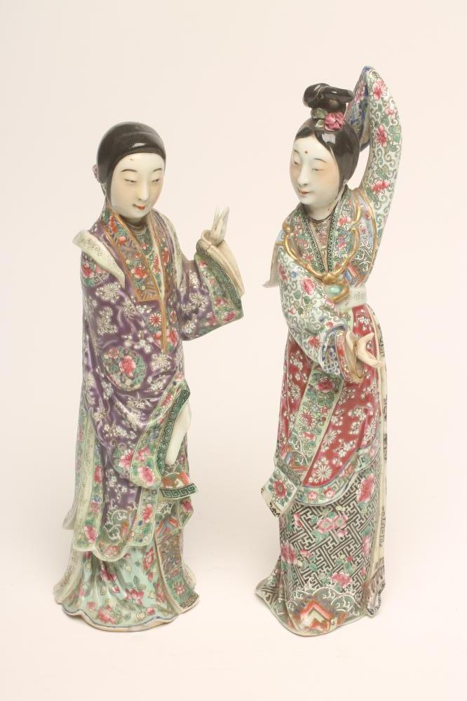 A PAIR OF CHINESE PORCELAIN FIGURES Image
