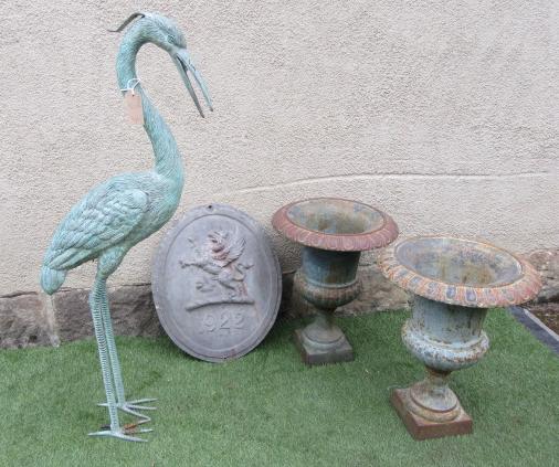 A PAIR OF VICTORIAN STYLE CAST IRON URNS of half fluted campana form with ovolu rim and square base Image