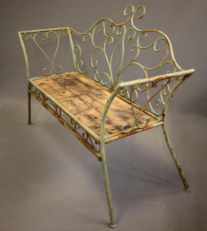 A TUBULAR METAL GARDEN BENCH Image