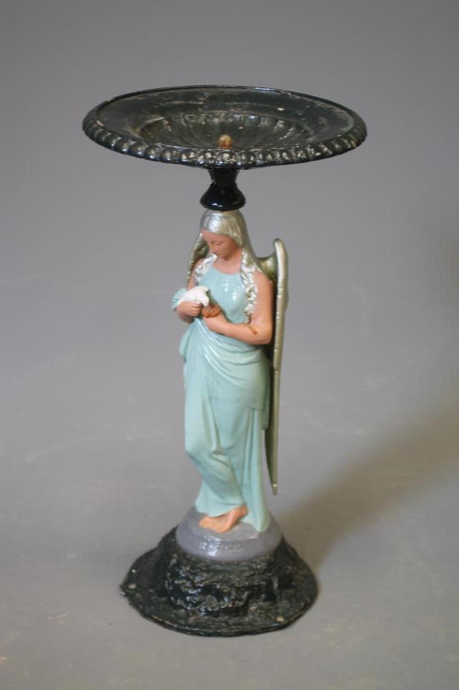 A VICTORIAN CAST IRON FIGURAL BIRD BATH Image