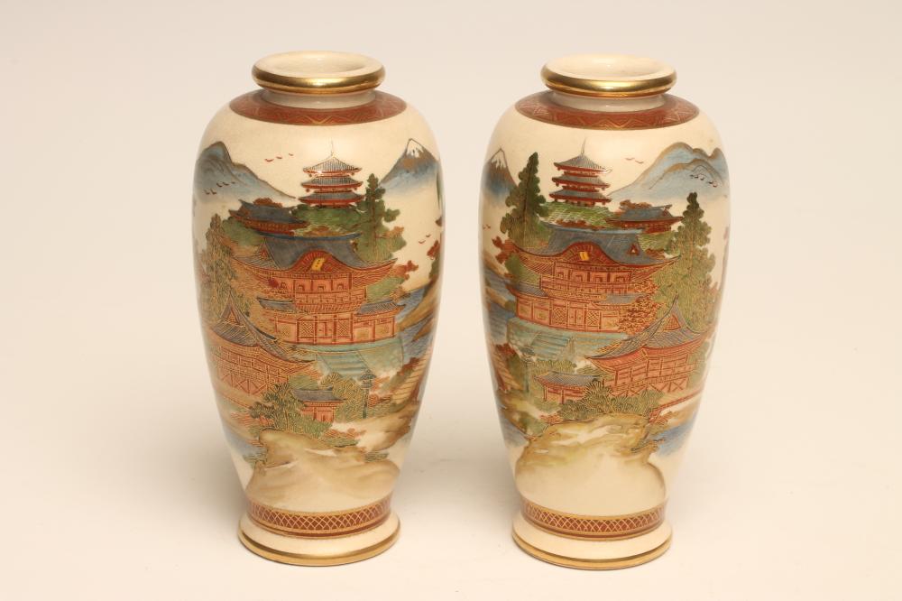 A PAIR OF SATSUMA EARTHENWARE VASES of rounded cylindrical form Image
