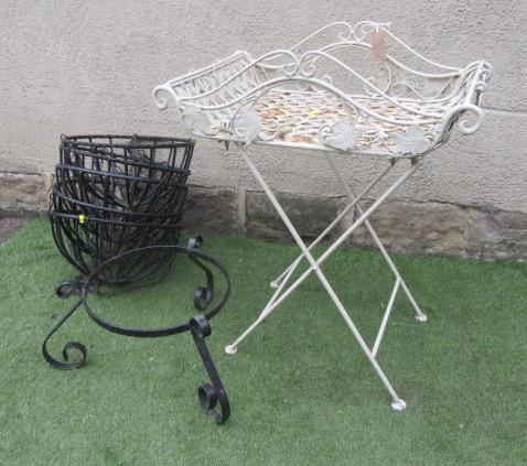 A TUBULAR METAL FLOWER POT STAND Image