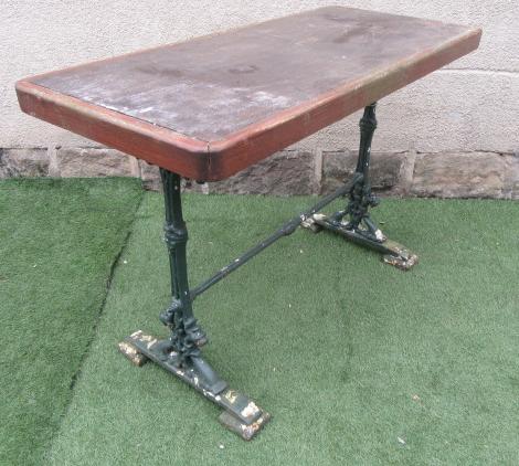 A VICTORIAN CAST IRON PUB TABLE of rounded oblong form Image