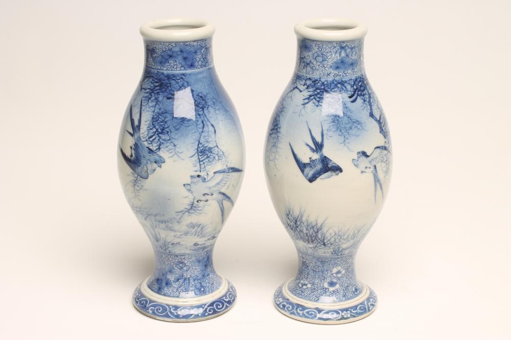 A PAIR OF JAPANESE PORCELAIN VASES of ovoid form on swept pedestals Image