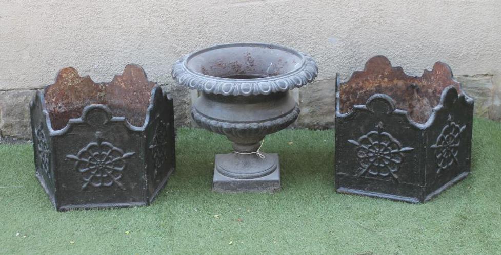 A PAIR OF CAST IRON PLANTERS Image