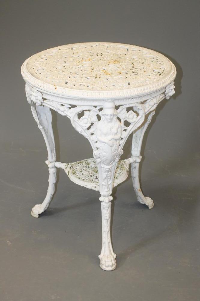 A VICTORIAN CAST IRON "BRITANNIA PATTERN" PUB TABLE of circular form with original pierced scrolling Image