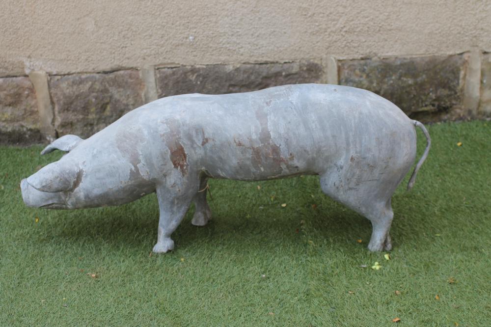 A LEAD FIGURE of a pig Image