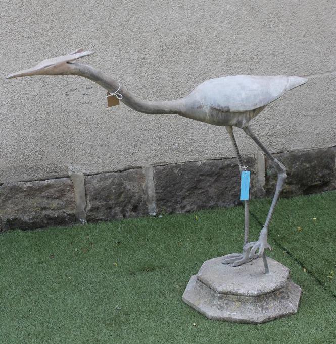 A LEAD FIGURE of a crane Image