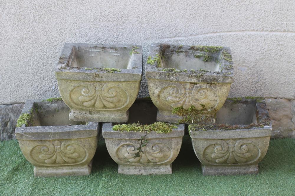 A SET OF FIVE COMPOSITION STONE PLANTERS of square form Image