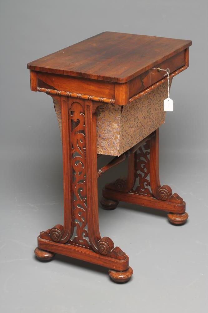 A WILLIAM IV ROSEWOOD WORK TABLE of rounded oblong form Image