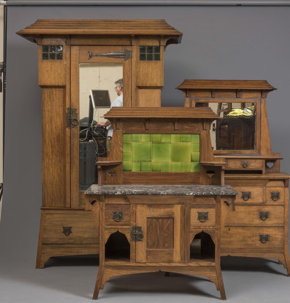 AN ARTS AND CRAFTS THREE PIECE OAK BEDROOM SUITE by Maple & Co. Image