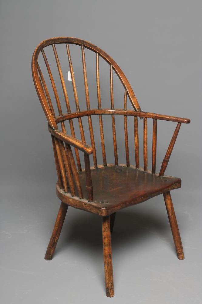 AN ASH AND ELM BOW BACK WINDSOR ARMCHAIR Image