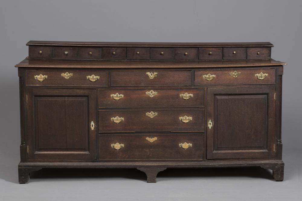 A GEORGIAN OAK ENCLOSED DRESSER Image