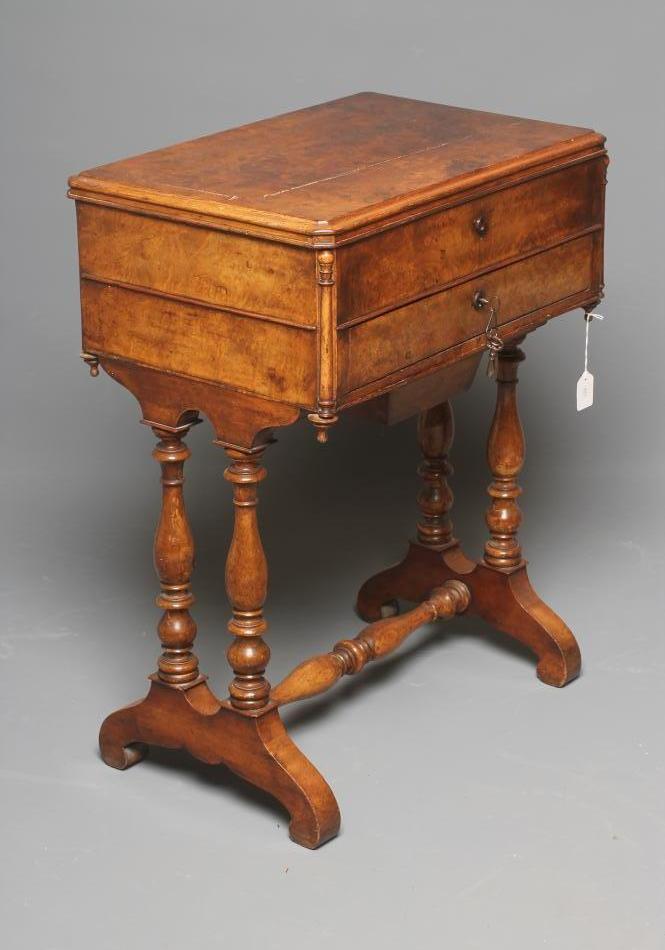 A VICTORIAN BURR WALNUT MUSICAL SEWING TABLE Image