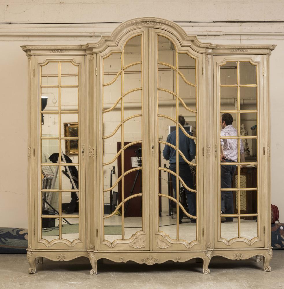 A FRENCH PAINTED AND PARCEL GILT GARDE DE ROBE Image