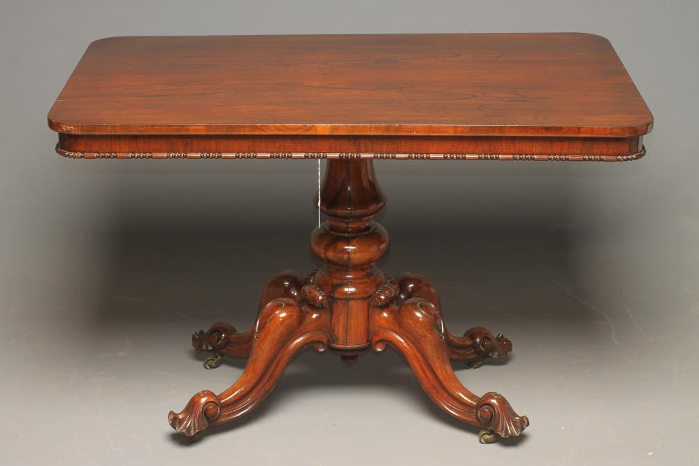 A VICTORIAN ROSEWOOD LIBRARY TABLE Image