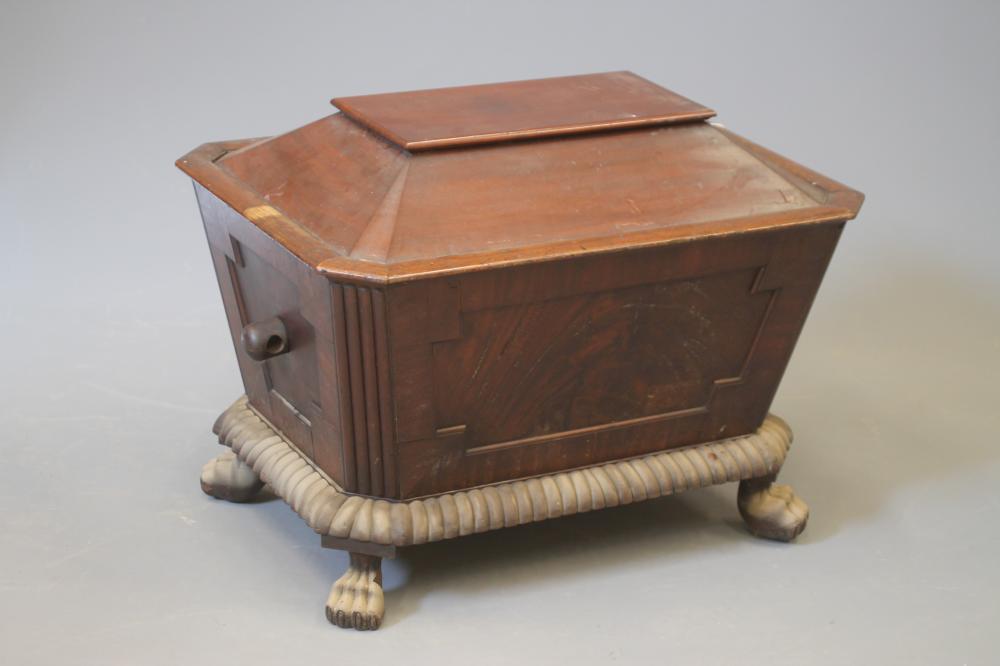 A REGENCY MAHOGANY CELLARETTE of sarcophagus form Image