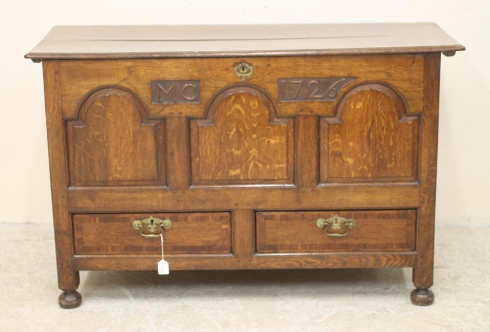 A GEORGIAN OAK PANELLED COFFER Image