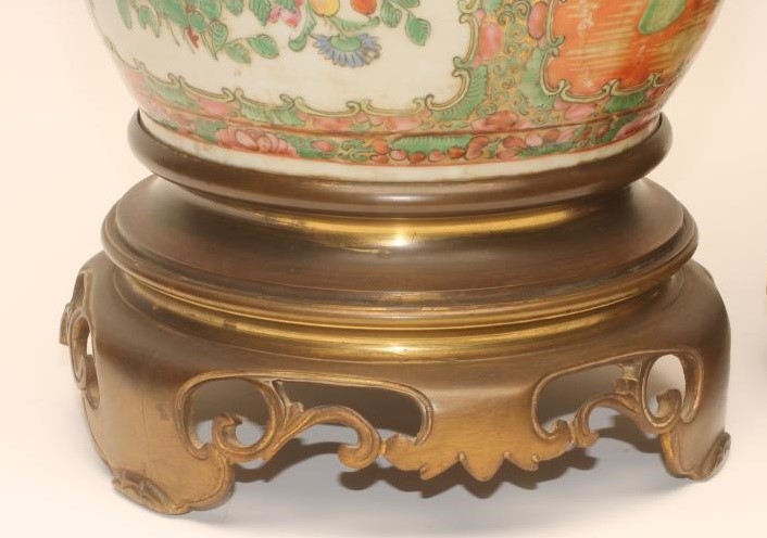 A PAIR OF CANTONESE PORCELAIN VASES of rounded cylindrical form with chi-long handles and Image