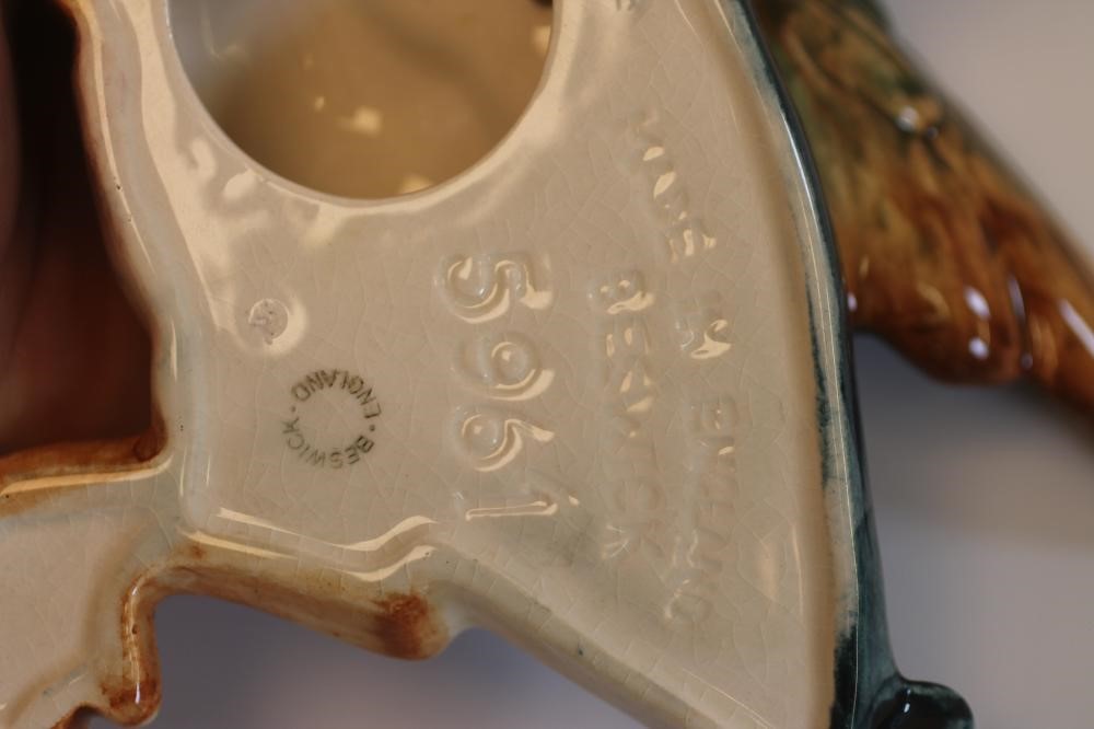 A GRADUATED SET OF FOUR BESWICK EARTHENWARE FLYING DUCKS Image