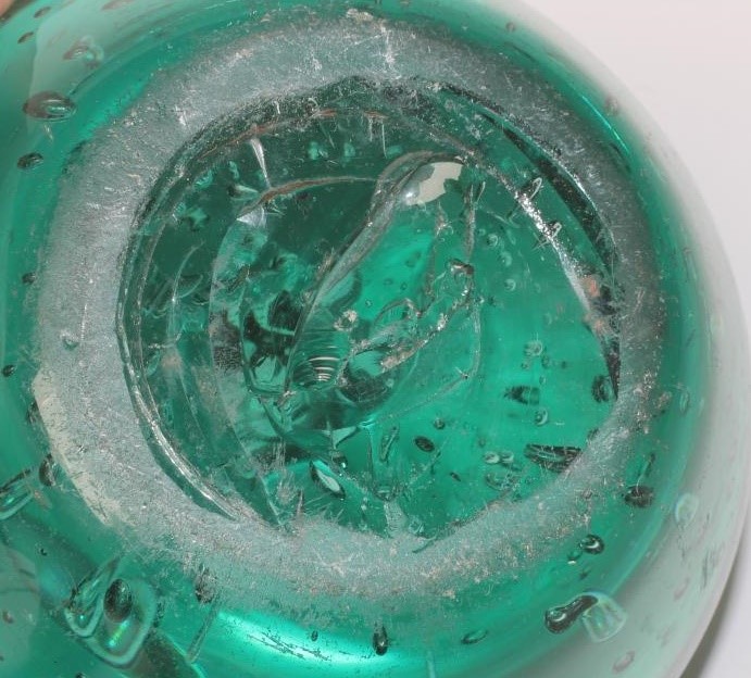 A VICTORIAN ENGLISH MILLEFIORE SCENT BOTTLE of domed form with coloured glass canes to base Image