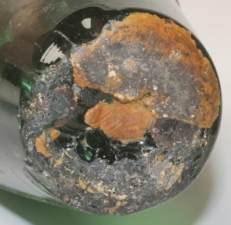 A VICTORIAN ENGLISH MILLEFIORE SCENT BOTTLE of domed form with coloured glass canes to base Image