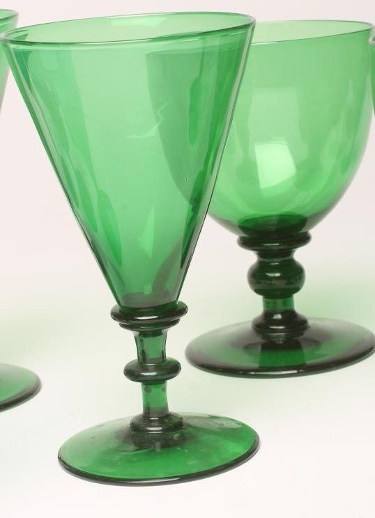 A SET OF SEVEN BRISTOL GREEN WINE GLASSES Image